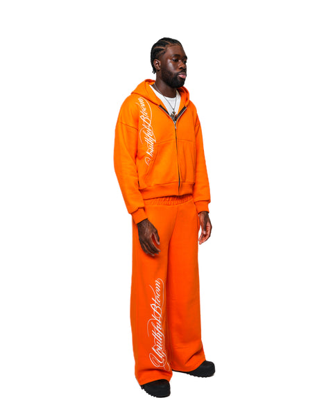 ORANGE CALLIGRAPHY PANTS
