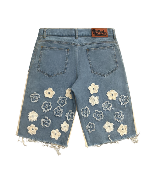 "distressed bloom jorts" (light blue)